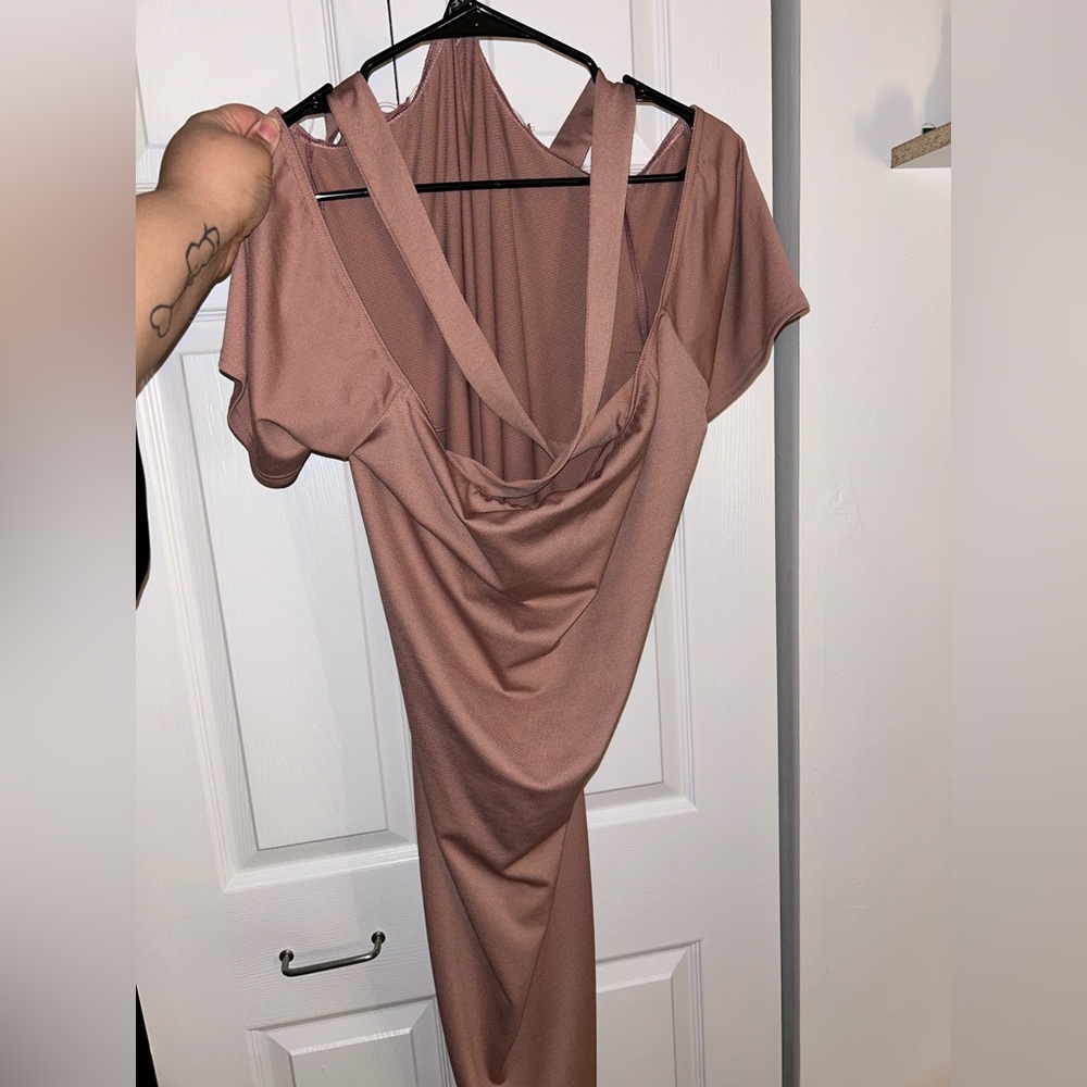 Mauve pink midi dress with cross cross straps across the chest